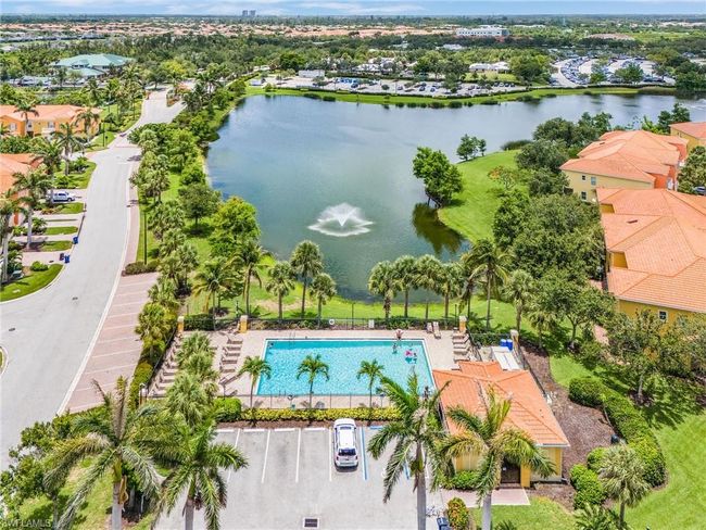 Drone / aerial view of a large body of water and a pool | Image 26