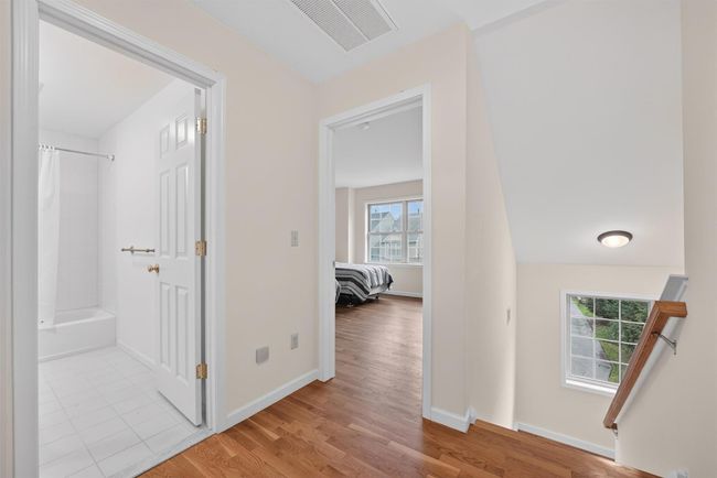 Corridor with hardwood floors | Image 20