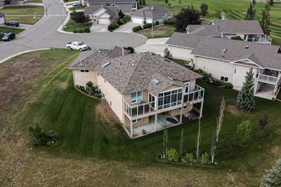 1203 Whispering Greens Pl, House detached with 4 bedrooms, 3 bathrooms and 4 parking in Vulcan AB | Image 3