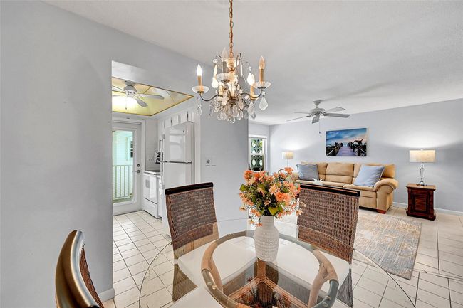 Your Dining Area is Conveniently Located next to Your Kitchen & Living Room. Being Sold Furnished, Turn-Key! | Image 6