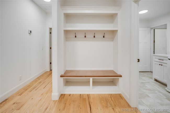 "Mudroom"seating just inside the garage entry into home | Image 28