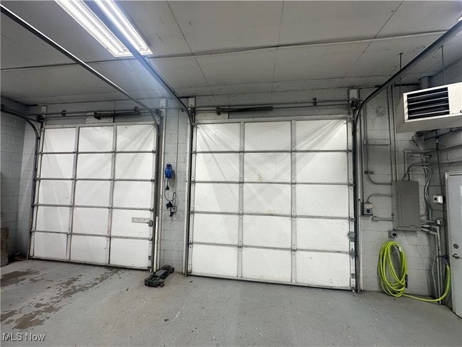 Garage with electric panel | Image 7