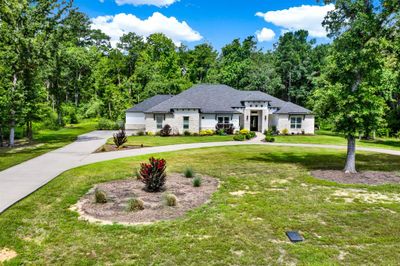 This home is perfect for entertaining with plenty of parking off the main road for all your guests!! Just say ahhh, I'm glad to be home!! | Image 3