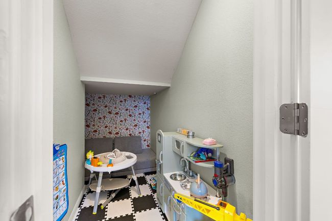 Another genius use of the HUGE understairs closet: a convenient kids' playroom! | Image 24