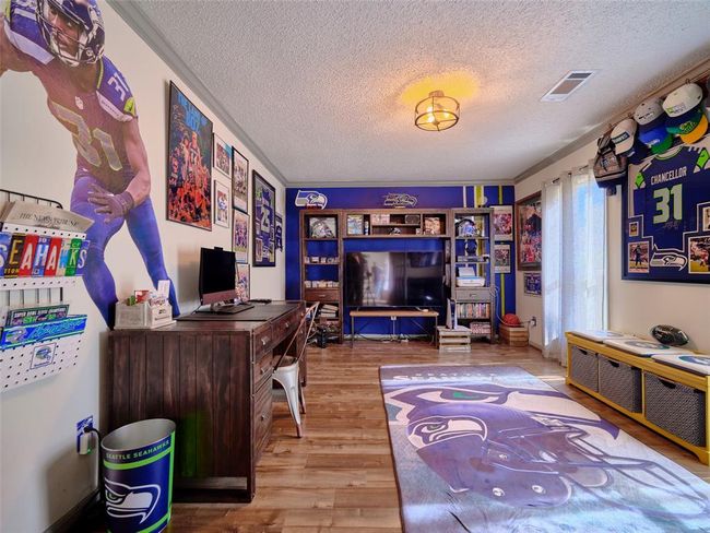 The spacious office is adjacent to the front entry. | Image 15