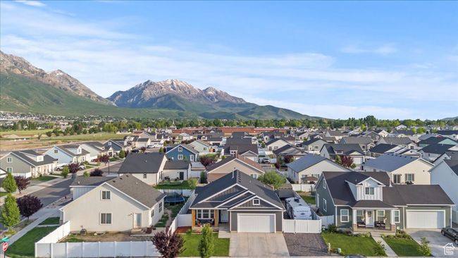 Aerial perspective of suburban area featuring a mountainous background | Image 32