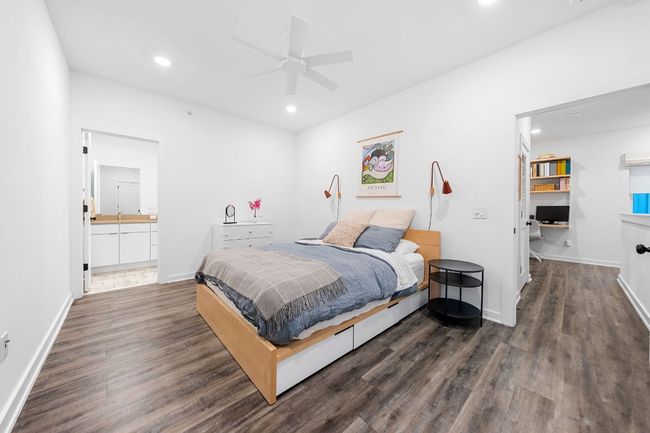 Bedroom with baseboards, dark wood-style flooring, recessed lighting, and a ceiling fan | Image 20