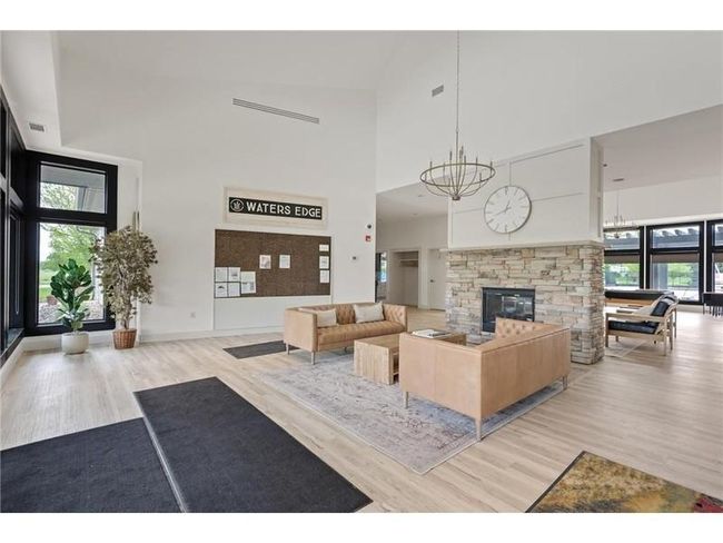 Your assoc fees include full access to the walkable and beautiful Waters Edge Community Center! pool, gym, and party room with kitchen! | Image 25