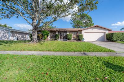 7515 Oakvista Circle, House other with 3 bedrooms, 2 bathrooms and null parking in Tampa FL | Image 1