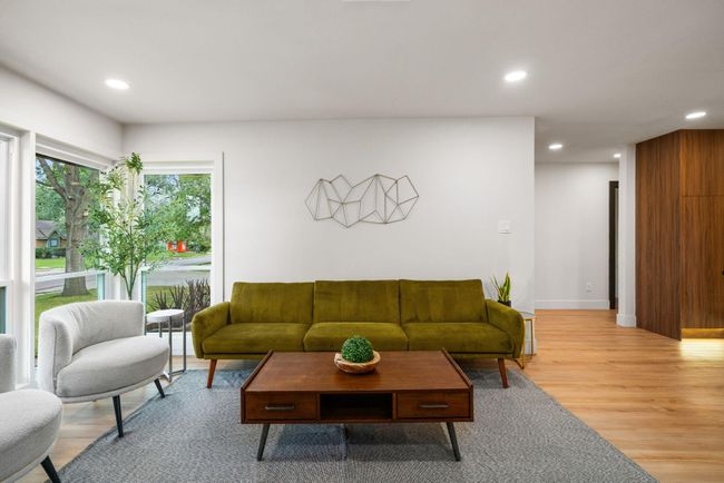 Chic setting wrapped in natural light from brand new windows throughout | Image 10