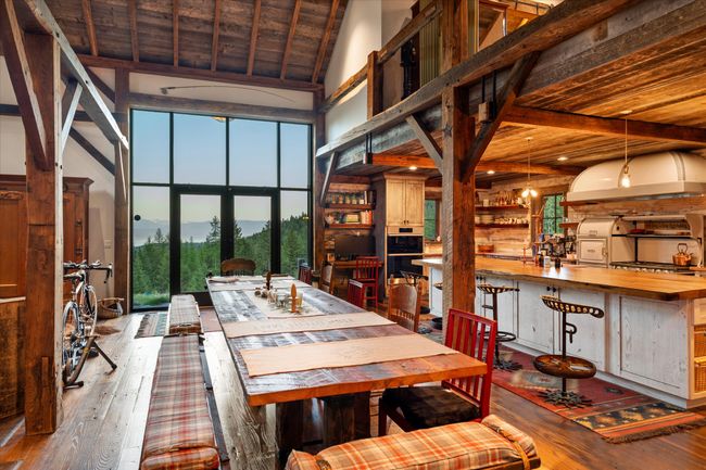 Handcrafted owner-design 14 foot dinning table begs to round up the posse for an evening of good food and conversation | Image 18