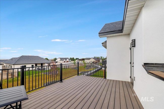 Deck featuring a residential view and a yard | Image 41