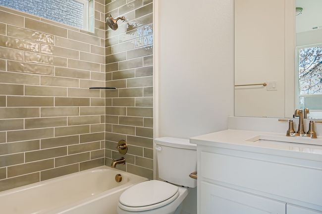 Bathroom with shower / tub combination and vanity | Image 19