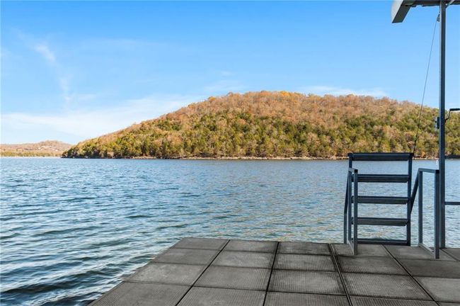 View of dock featuring a water view and a wooded view | Image 66