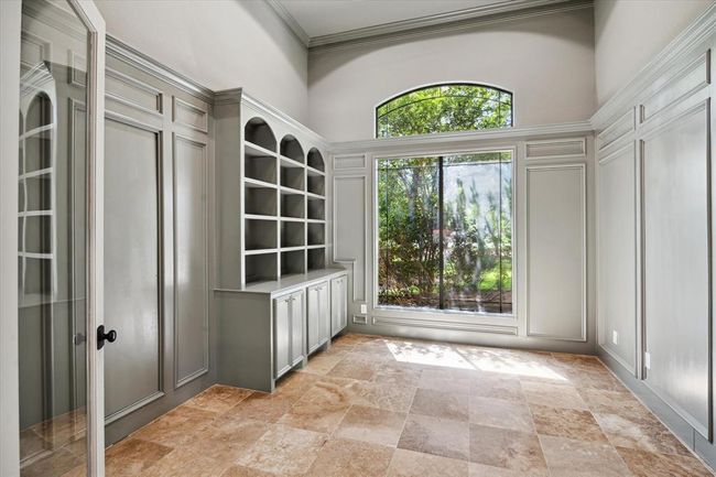 Soaring Ceiling Office with Custom Built-In Bookcase/Shelving | Image 26