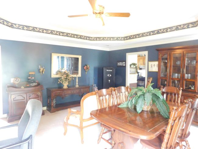 Main Living Area, formerly a Dining Room for Family Entertaining | Image 10