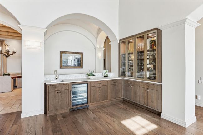 The wet bar is located in the family room. | Image 12