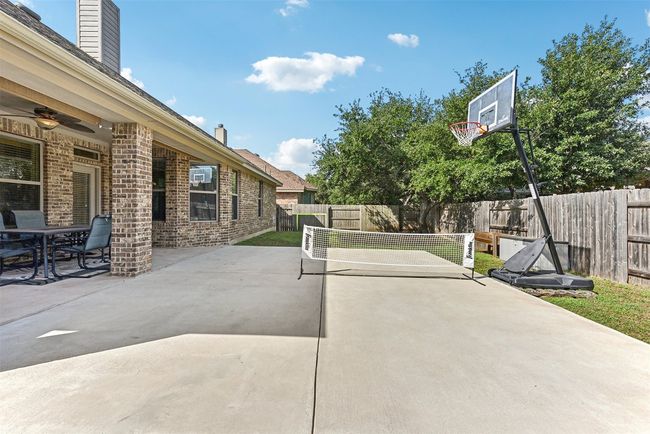 There’s even enough space on the oversized patio for a friendly game of cornhole or pickleball, making it a go-to spot for gatherings and good times | Image 33