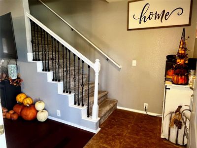 Stairs with tile patterned flooring | Image 3