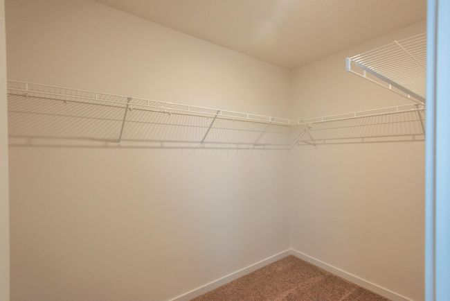 Primary walk-in closet | Image 9