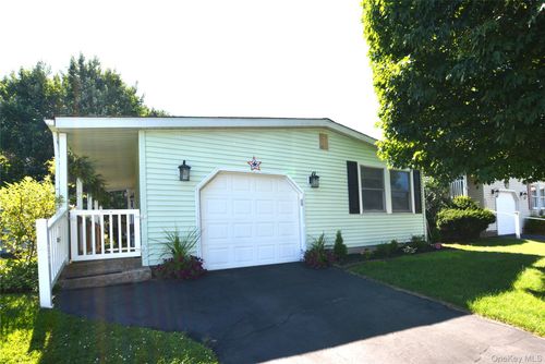 105-105 Village Cir W, Manorville, NY, 11949-9671 | Card Image