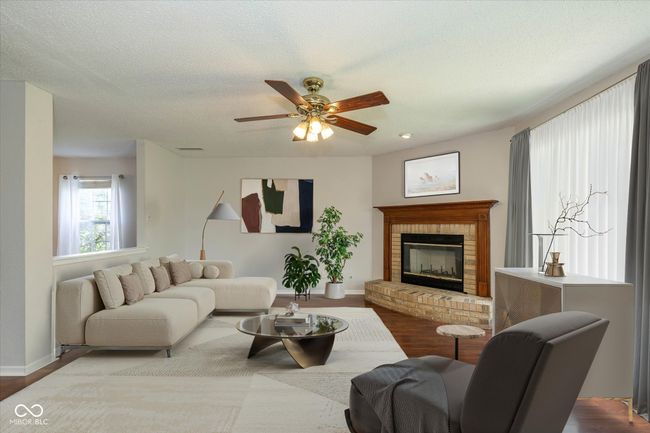 Family/dining room. Virtually staged. | Image 6