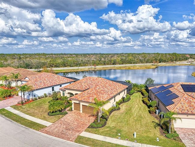 Aerial View of House on Lake | Image 8