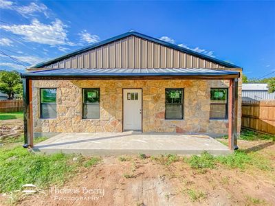 Stone front is reclaimed from the original farmhouse that was on the property | Image 1