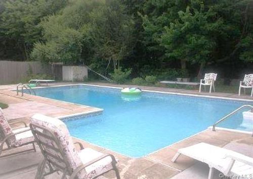 49 Winston Dr, Brentwood, NY, 11717-7518 | Card Image