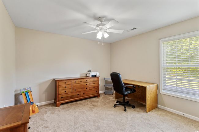 Office space with carpet and ceiling fan | Image 25