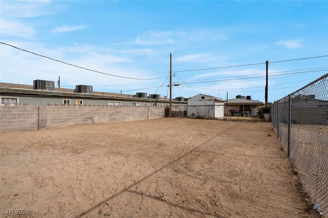 View of yard featuring a fenced backyard | Image 33