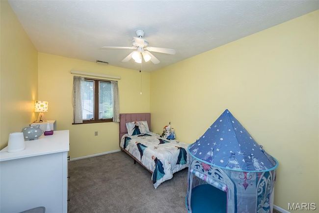 Carpeted bedroom with baseboards and ceiling fan | Image 22
