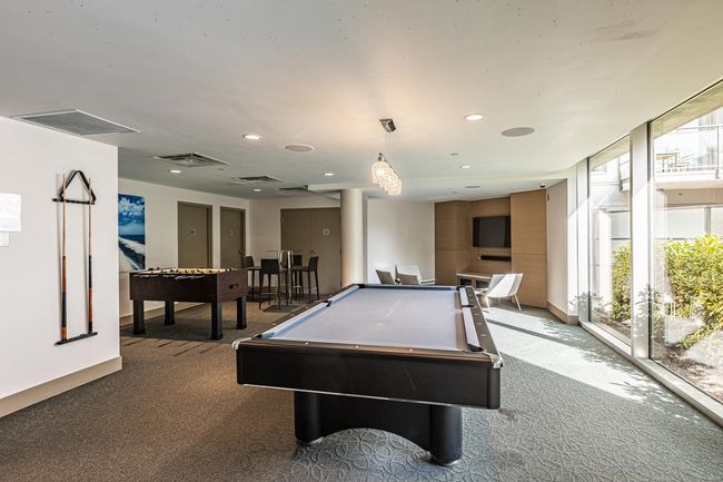 Playroom featuring carpet, billiards, plenty of natural light, recessed lighting, and baseboards | Image 22