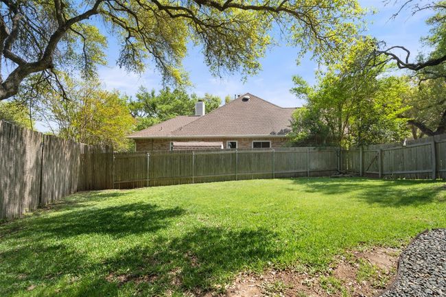 View of yard with a fenced backyard | Image 40