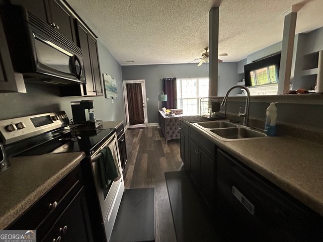6550 Capitol Knl, Townhouse with 3 bedrooms, 3 bathrooms and null parking in Fairburn GA | Image 6