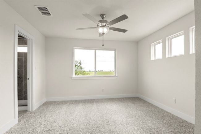 Empty room featuring visible vents, carpet, ceiling fan, and baseboards | Image 18