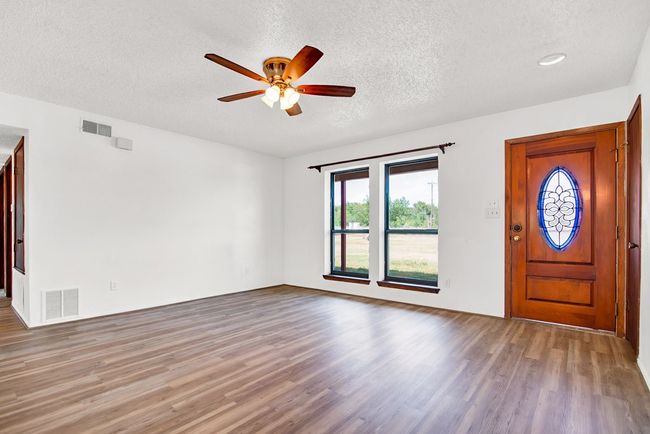 Living room to hallway. | Image 9