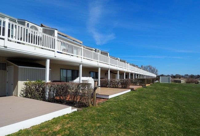 View of yard with a wooden deck | Image 29