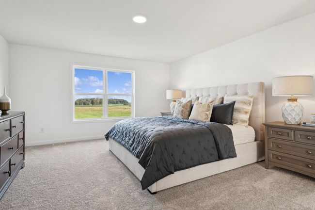 (Photo of a decorated model, actual homes finishes will vary) The foyer with the formal dining area just off the side. | Image 9