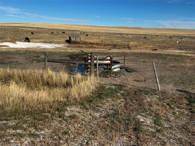 View of yard featuring a rural view and fence | Image 53