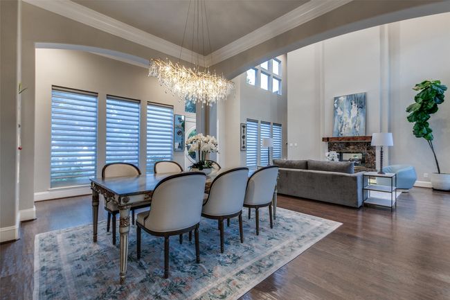 The formal dining area has a fabulous chandelier, and offers plenty of room for a large dining table for those wonderful dinner parties. | Image 7