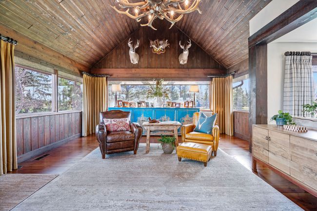Sitting area at Entrance of home. Featuring recessed lighting, an inviting chandelier, wood finished floors. | Image 14