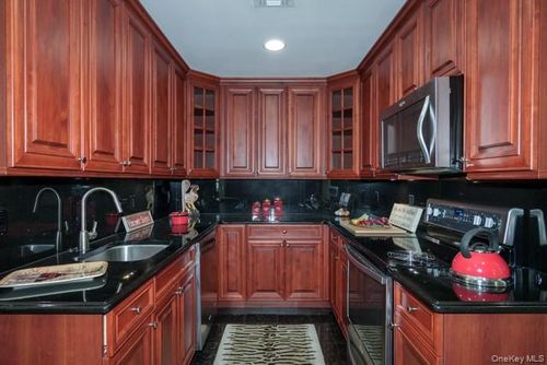 203-203 Adams Way, Sayville, NY, 11782-1940 | Card Image