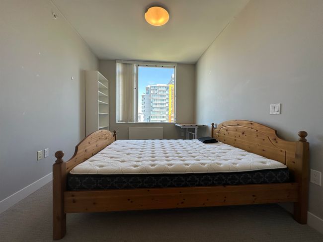 Carpeted bedroom with baseboards | Image 13