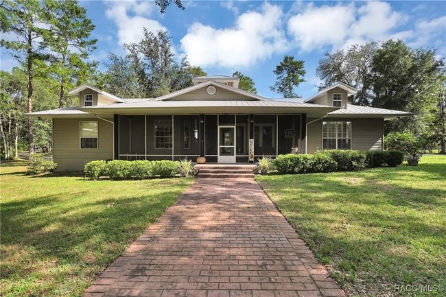 7802 Fairwind Loop, House other with 3 bedrooms, 2 bathrooms and 2 parking in Hernando FL | Image 5
