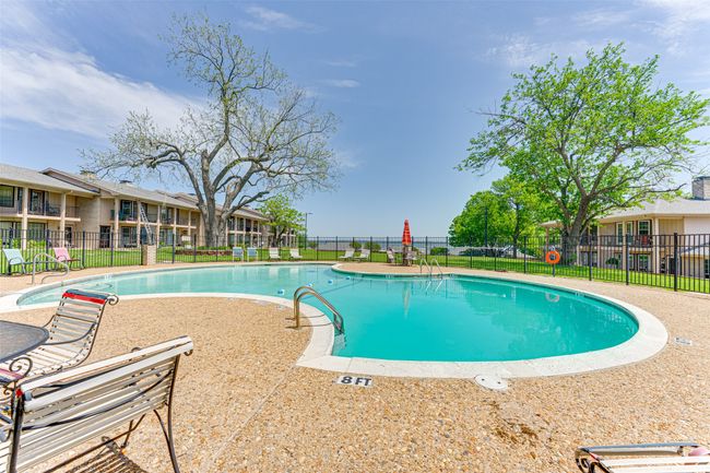 Pool featuring fence and a patio | Image 25