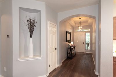 Foyer ~ Art niche & arched doorways | Image 3