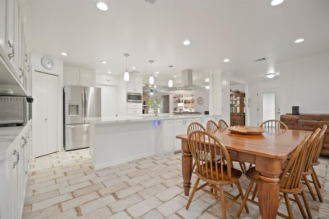 Expansive dining room - can seat 12! Open concept into the kitchen. | Image 13