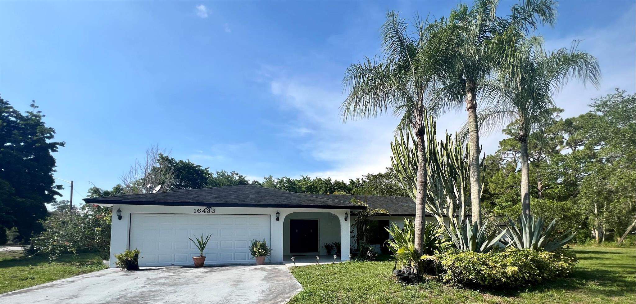 Glasgow Dr, Loxahatchee, FL 33470