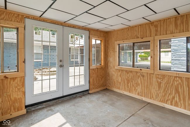unfurnished sunroom with french doors | Image 42